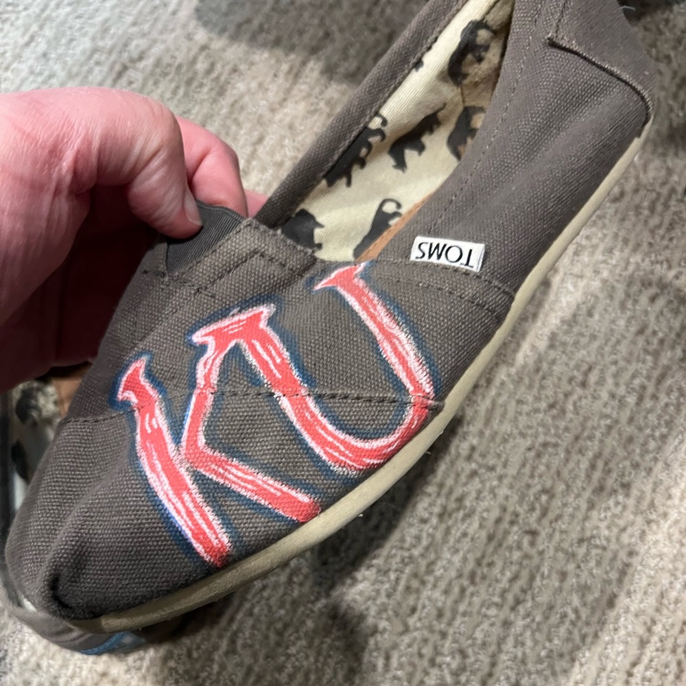 Size 10 women’s Toms. Custom Kansas Jayhawks hand painted